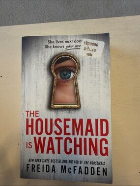 The Housemaid Is Watching Paperback - White & Red Cover